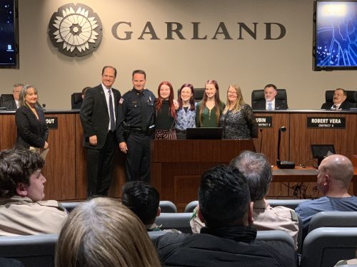 Chief Bryan with his family and outgoing Chief Mitch Bates.